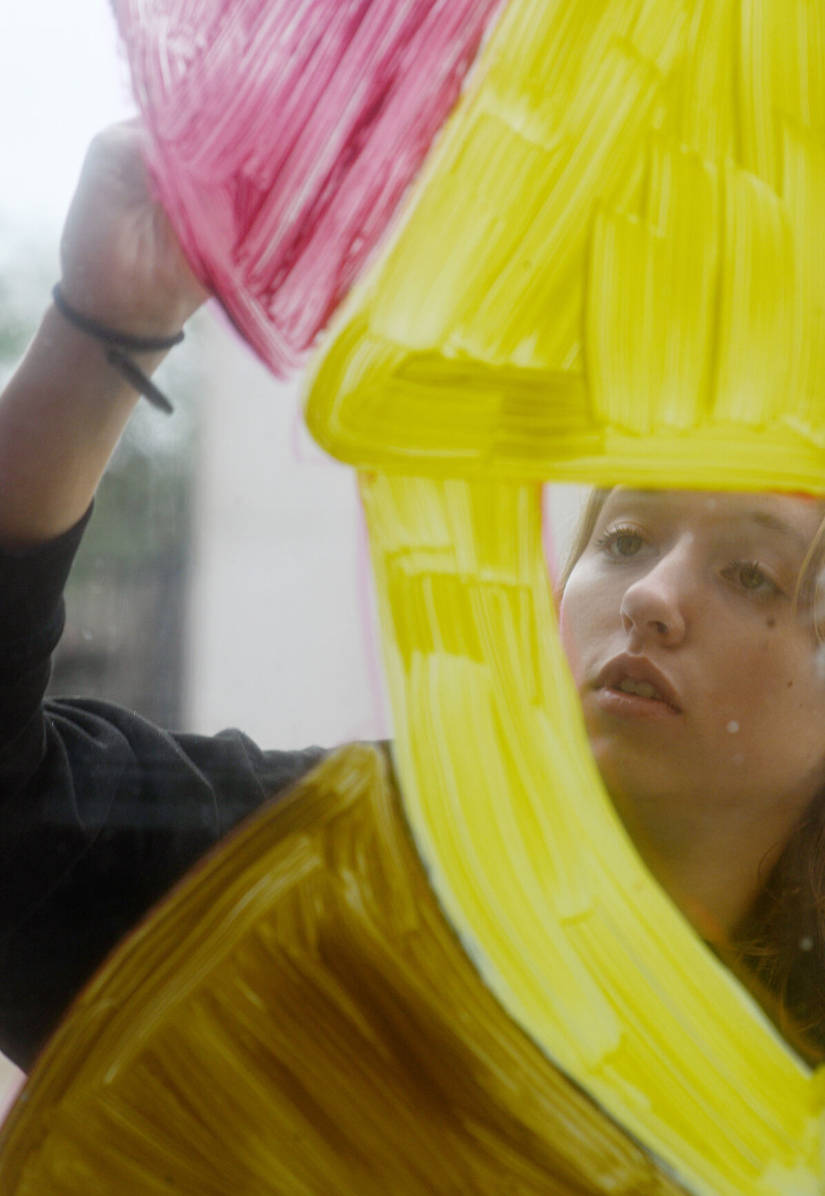 MU freshman Stephanie Hooker paints during Decorate the District (copy)